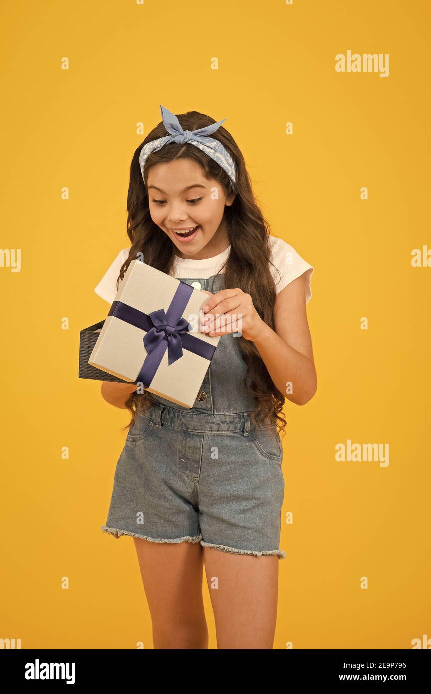 Time to shop. cheerful kid open wrapped box. best resent ever. gift she  expected. small girl customer open gift. happy holiday celebration.  birthday party surprise. shopping online delivery Stock Photo - Alamy