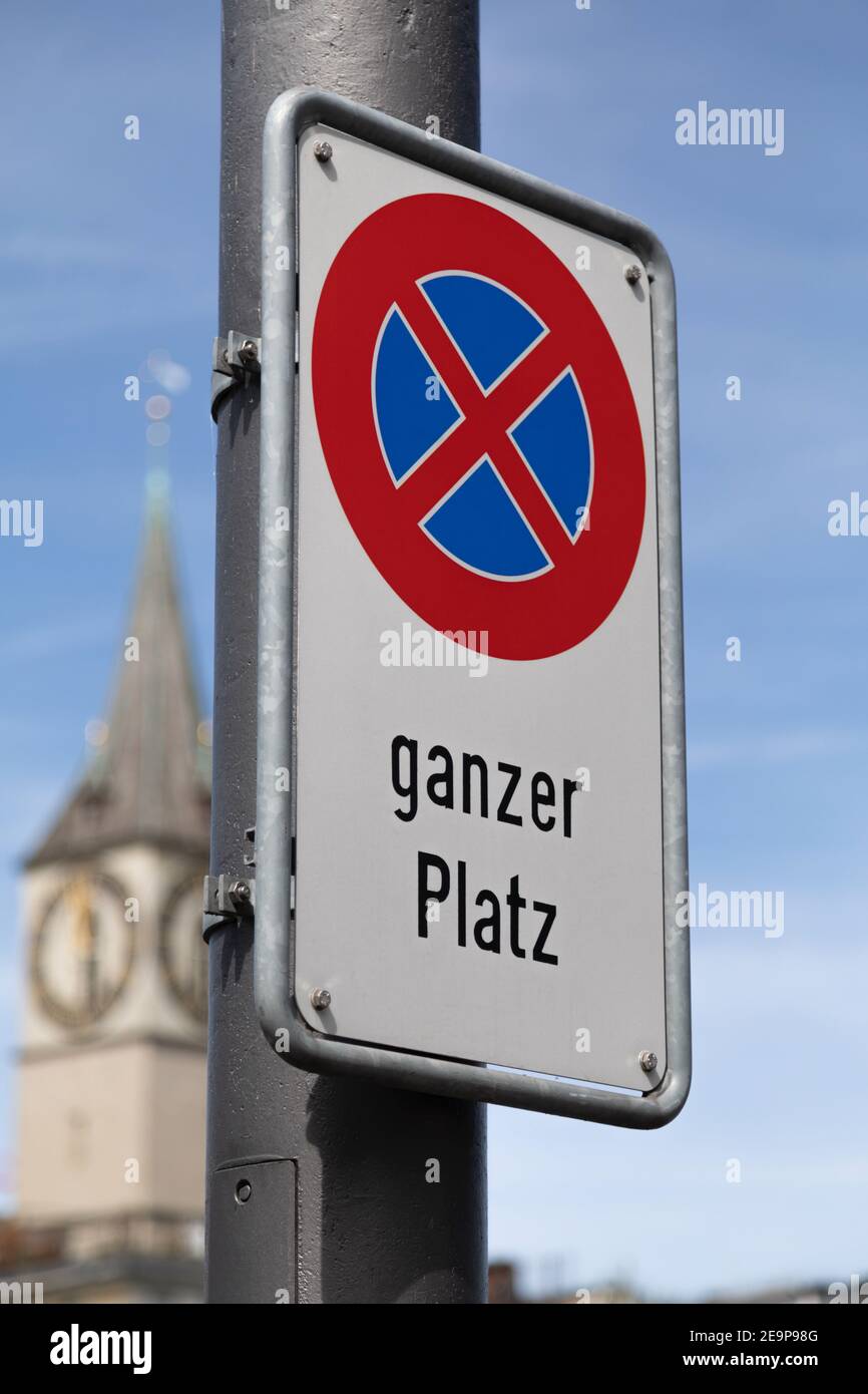 official no stopping sign in front of a church. german text translation: no stopping, whole place Stock Photo