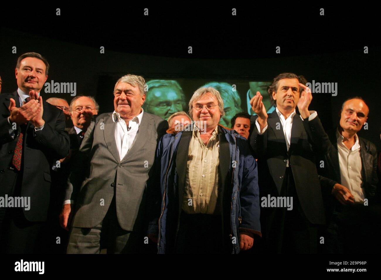 Jean-Luc Moudenc (Mayor of Toulouse), Claude Lanzmann (French Movie director), Robert Redeker, Bernard-Henry Levy (French writer) and Philippe Val (Charlie Hebdo's chief editor) during the meeting to support Robert Redeker (French Philosophy teacher who has been forced into hiding after making controversial remarks about the Prophet Muhammad and received death threats) at the Mermoz Hall in Toulouse, France, on november 15, 2006. Photo by Manuel Blondeau/ABACAPRESS.COM Stock Photo