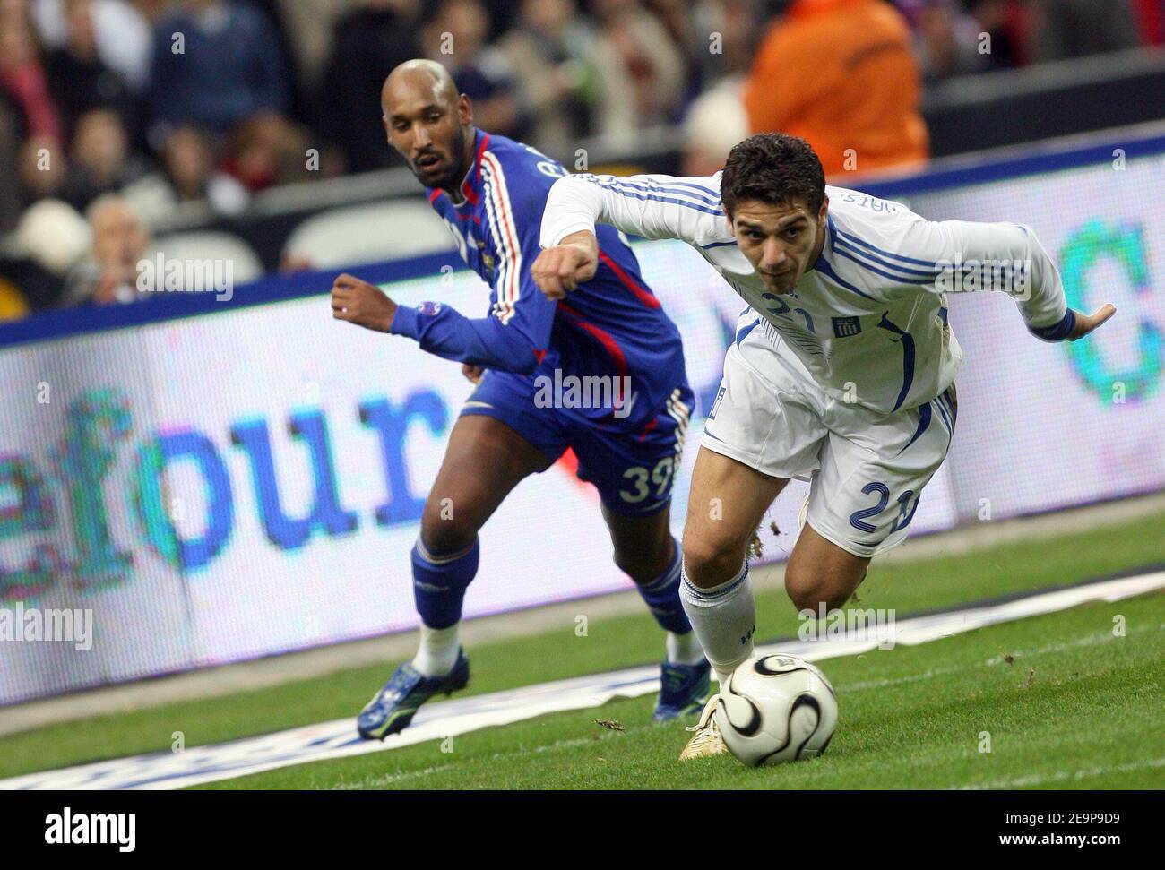 Nicolas Anelka and Greece's Konstantinos Katsouranis battle for the ball during International Friendly match, France vs Greece at the Stade de France, in Paris, France on November 15, 2006. France won 1-0. Photo by Gouhier-Taamallah/Cameleon/ABACAPRESS.COM Stock Photo