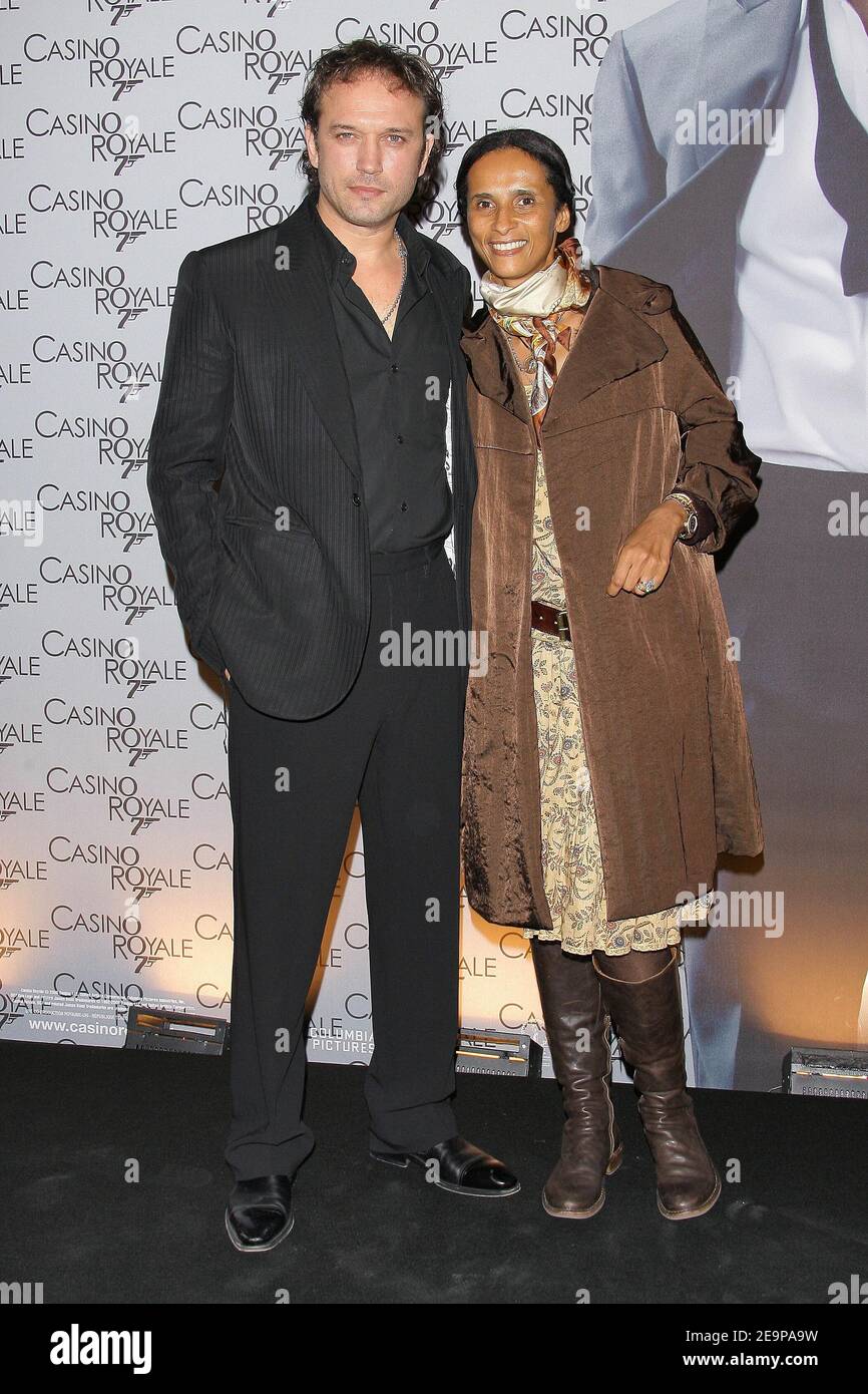 Swiss actor Vincent Perez and his wife Karine Sylla pose together as they arrive to the premiere of the new 007 'Casino Royale' held at the Grand Rex theatre in Paris, France, on November 17, 2006. Photo by Khayat-Nebinger/ABACAPRESS.COM Stock Photo