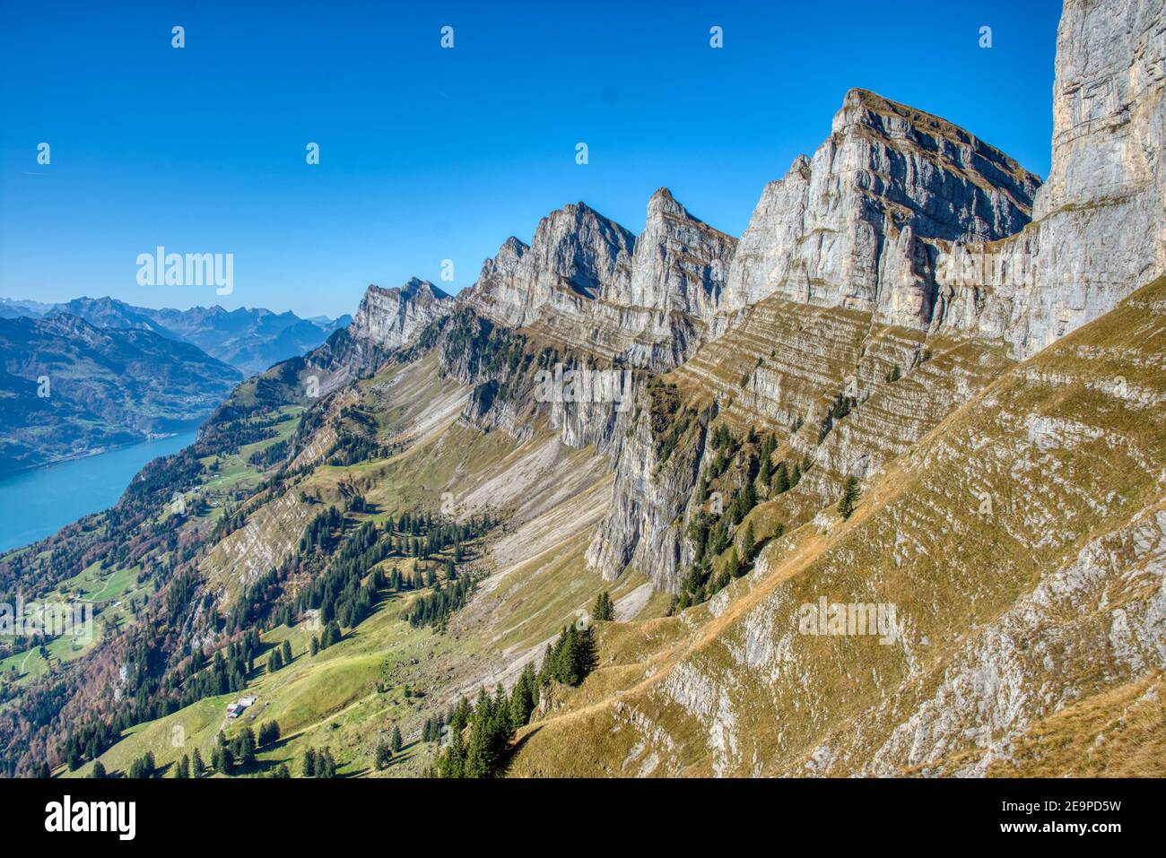 breathtaking view from the churfirsten of the wallensee, hiking trail below the face of the schnuerliweg, switzerland Stock Photo