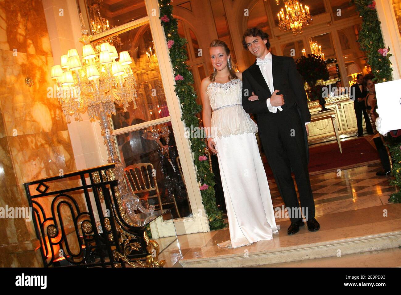 EXCLUSIVE. NO TABLOIDS. Zoe Bullock from Russia (wearing a Chapurin dress)  and her escort Sebastien Deletaille during the 16th annual Paris Crillon  Ball (Le Bal Des Debutantes) on November 25, 2006, held