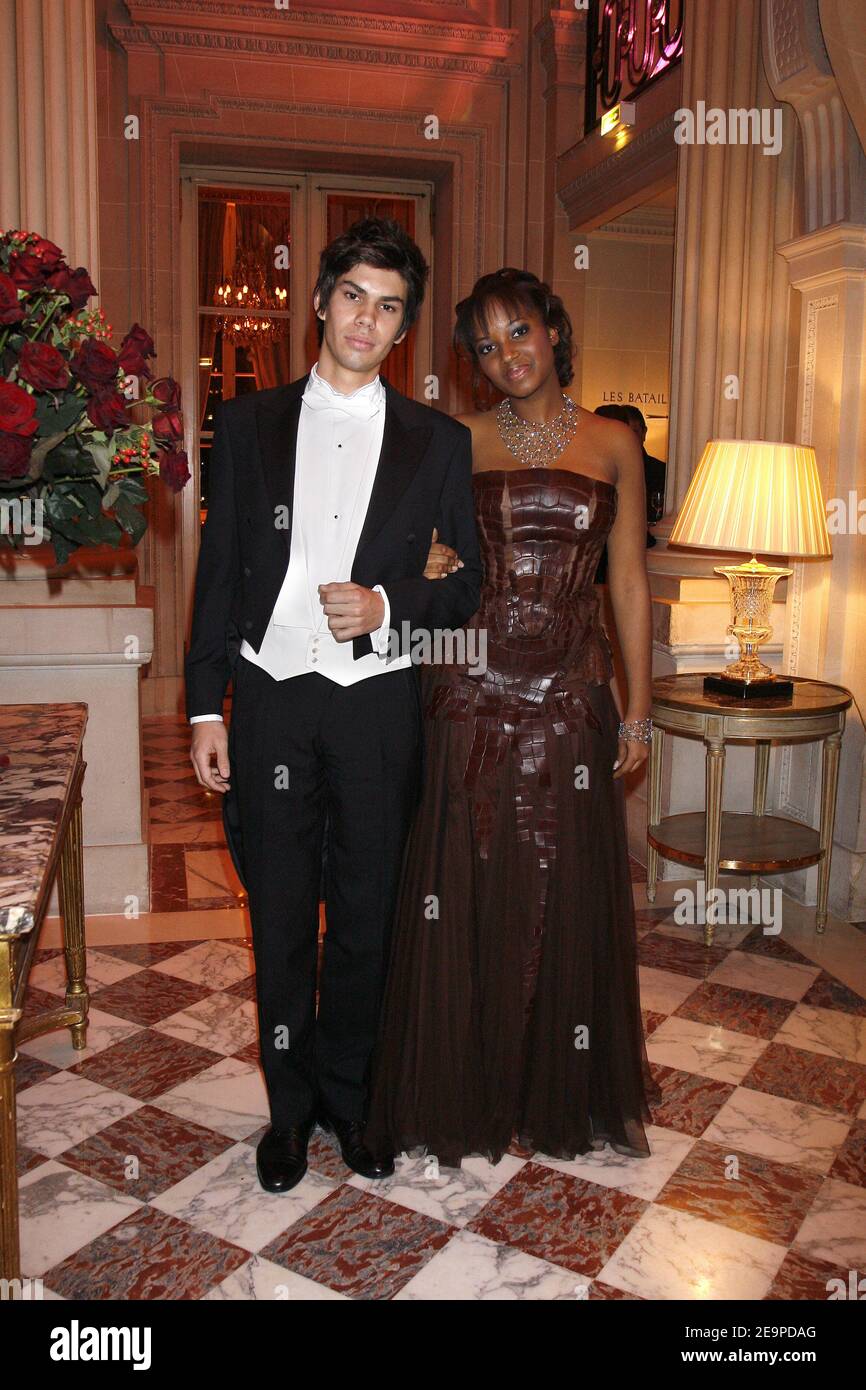 EXCLUSIVE. NO TABLOIDS. Elisabeth Senghor from Senegal (wearing a Gaultier  dress) and her escort Alexis Garcia during the 16th annual Paris Crillon  Ball (Le Bal Des Debutantes) on November 25, 2006, held