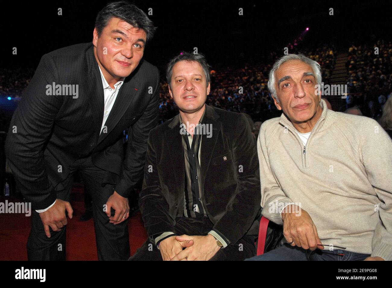 French Former judo Olympic champion David Douillet,Thierry Rey and actor Gerard Darmon attend the WBA international light flyweigh at the Palais Omnisports Paris-Bercy in Paris, France on December 2, 2006. Photo by Nicolas Gouhier/Cameleon/ABACAPRESS.COM Stock Photo