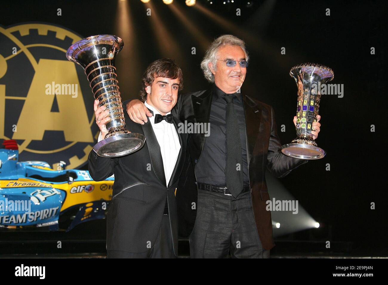Formula one champion Fernando Alonso of Spain and Renault team manager  Flavio Briatore of Italy pose with their trophies at the 2006 FIA Gala held  in Monaco on December 8, 2006. Photo