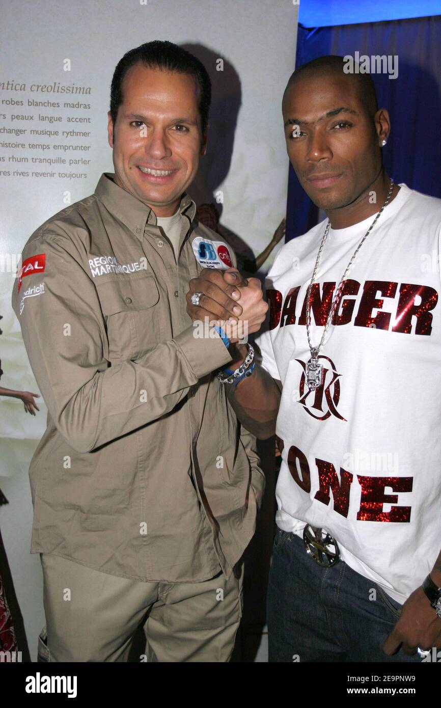 Simon Jean Joseph and Lord Kossity attend the presentation of French driver Simon  Jean Joseph's car to compet on upcoming rallye 'Dakar 2007' at the club  'L'Etoile' in Paris, France, on December