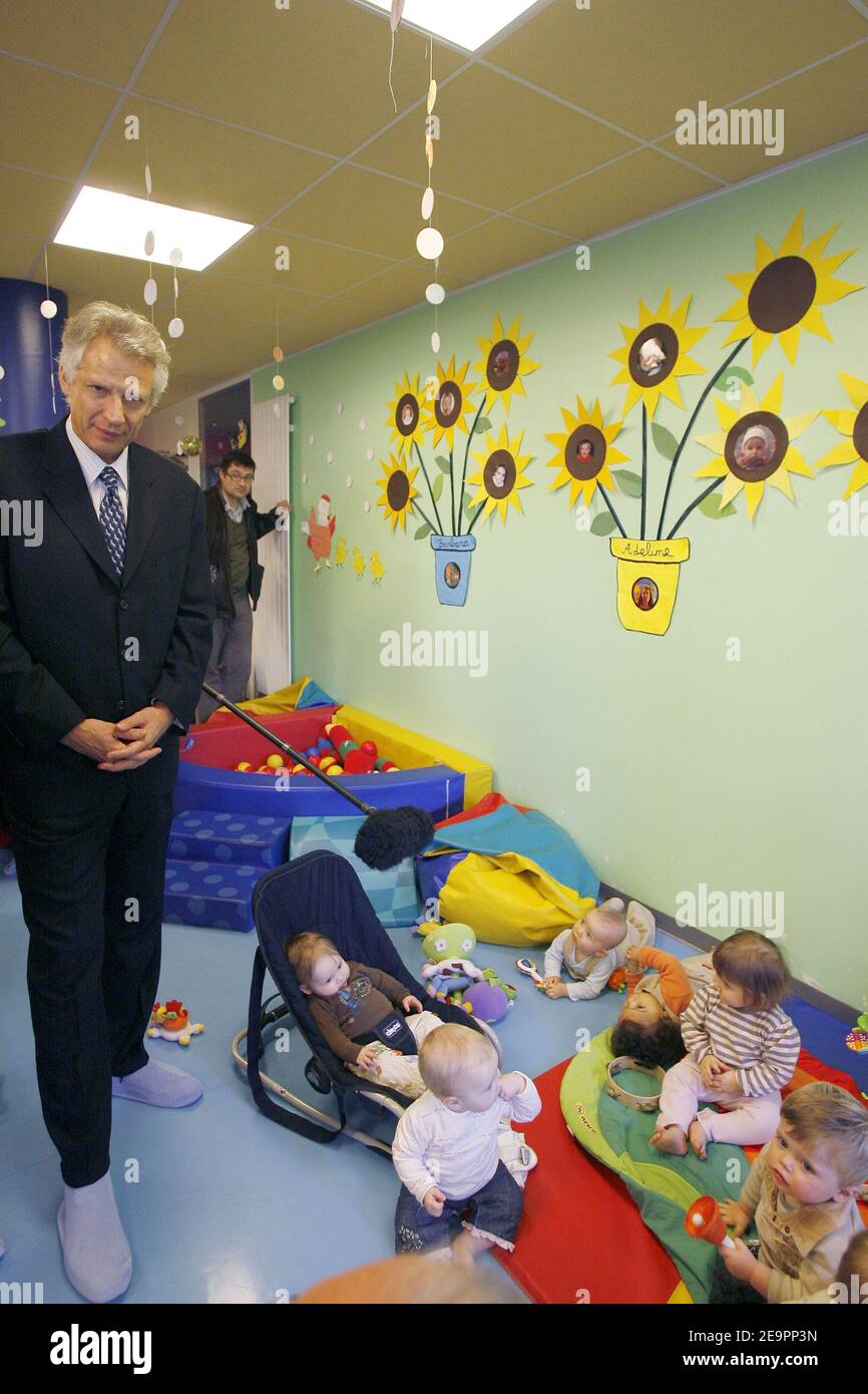 French Prime minister Dominique de Villepin, and Philippe Bas, minister  delegate for Social Security, the Elderly, the Disabled and the Family,  visit a kindergarden installed on the industrial site of Rungis, near