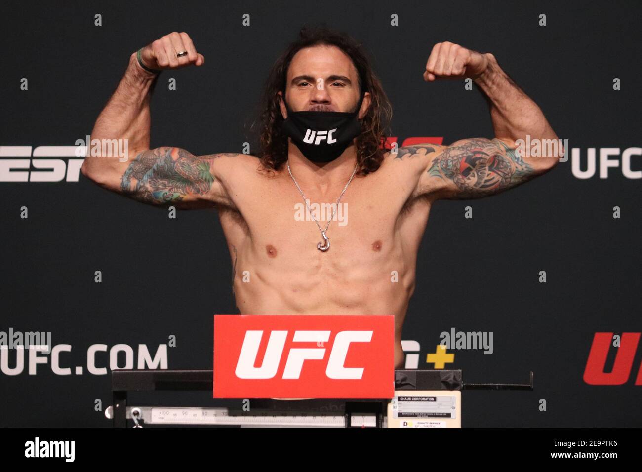 Las Vegas, Nevada, Las Vegas, NV, USA. 6th Feb, 2021. Las Vegas, NV - February 6: Clay Guida poses on the scale during the UFC Vegas 18 weigh-ins at UFC Apex on February 6, 2021 in Las Vegas, Nevada, United States. Credit: Diego Ribas/PX Imagens/ZUMA Wire/Alamy Live News Stock Photo