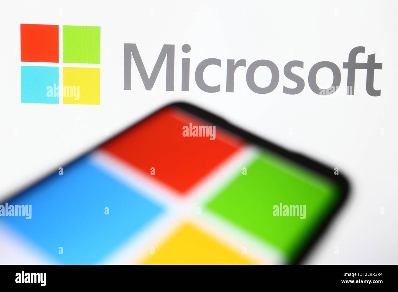 In this photo illustration a Microsoft logo is seen on a mobile phone ...