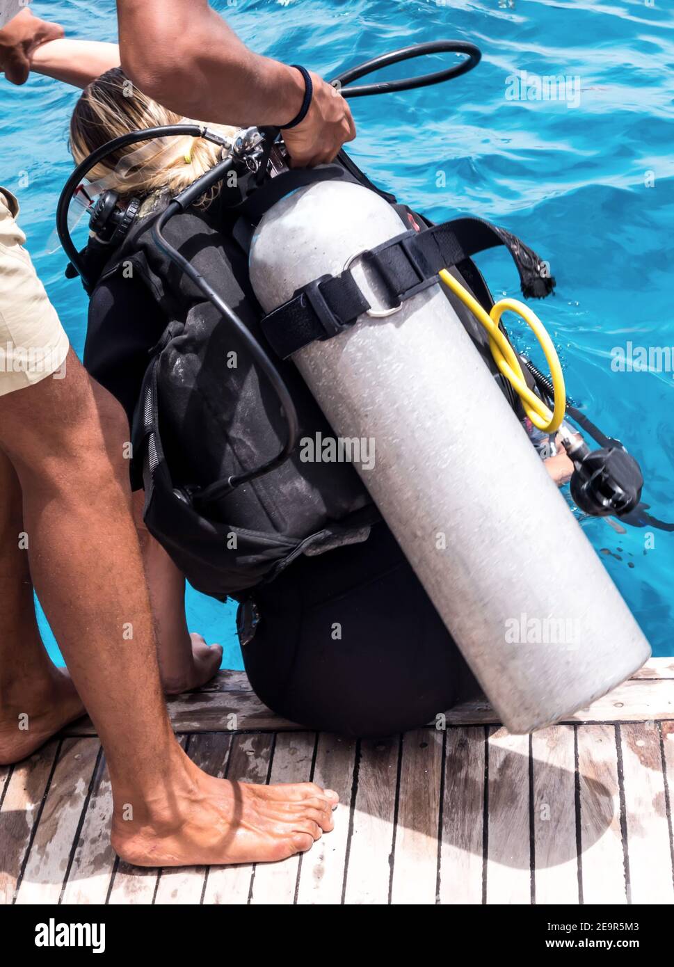 Diver teaches students to dive. divers deck of the sailboat are trained