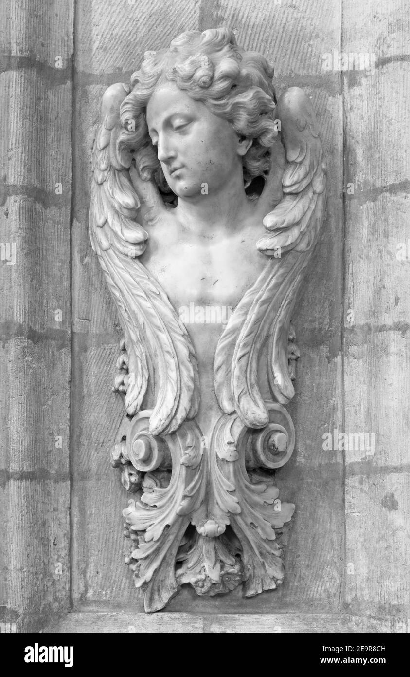 BRUSSELS, BELGIUM - JUNE 15, 2014: The baroque stoup in church Notre Dame du Bon Secource. Stock Photo