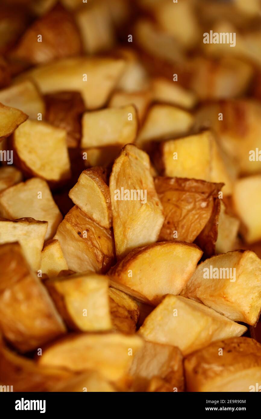 https://c8.alamy.com/comp/2E9R90M/cutting-potatoes-in-small-pieces-close-up-catering-background-modern-high-quality-prints-2E9R90M.jpg
