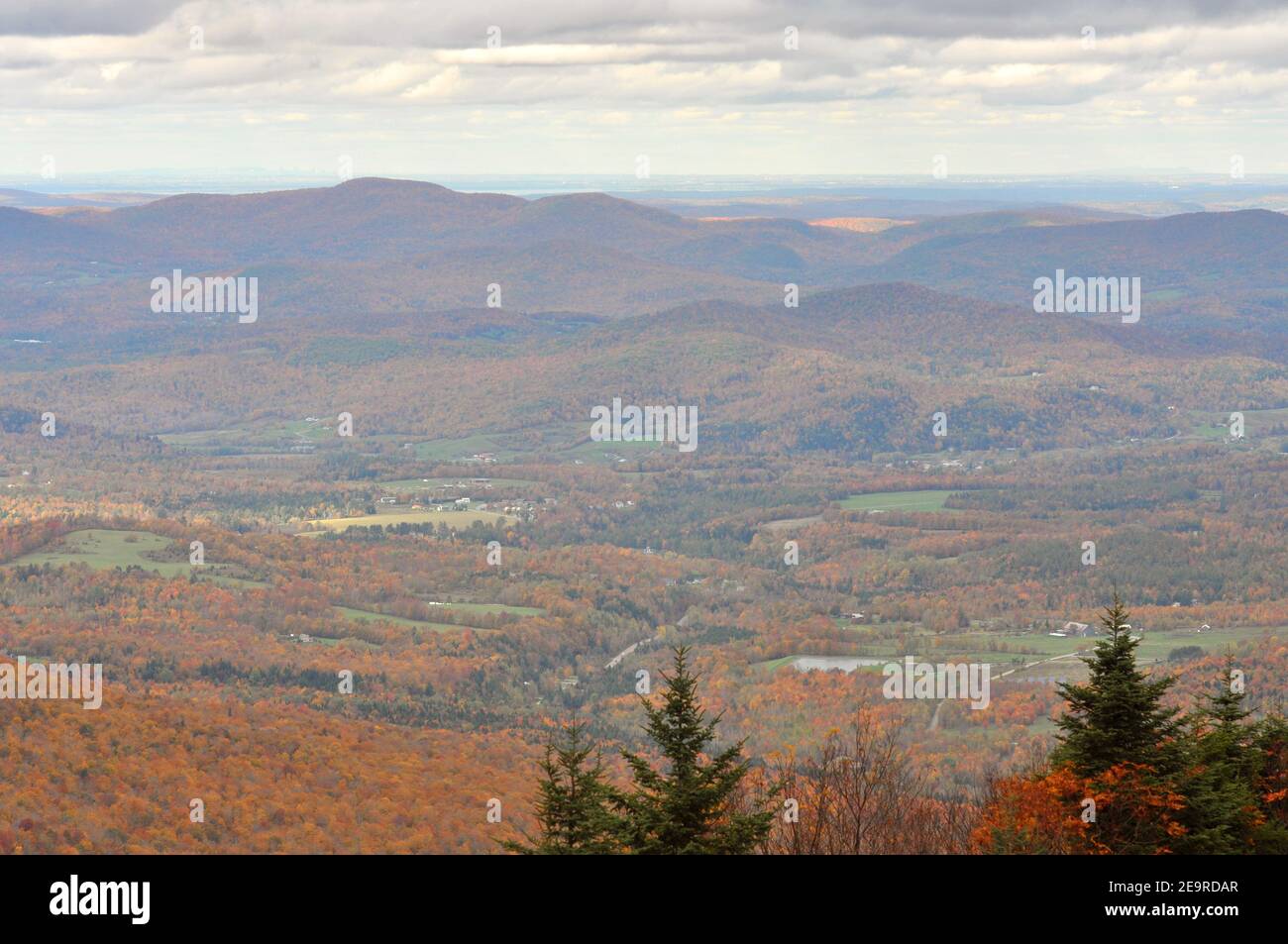Fall Foliage of Green Mountains from top of Sterling Mountain near Smugglers' Notch in Vermont VT, USA. Stock Photo