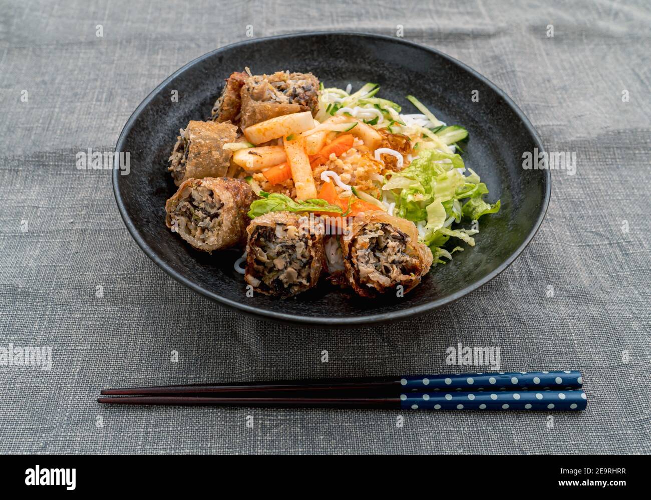 Vietnamese noodles with fried spring rolls Stock Photo Alamy