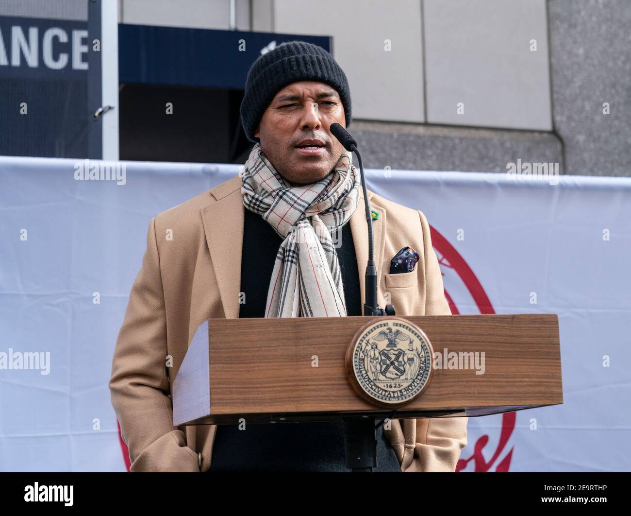 New York, United States. 05th Feb, 2021. Mariano Rivera speaks at opening  of mass vaccination site at Yankee Stadium with Yankees baseball team logo  on a backdrop in New York, on February