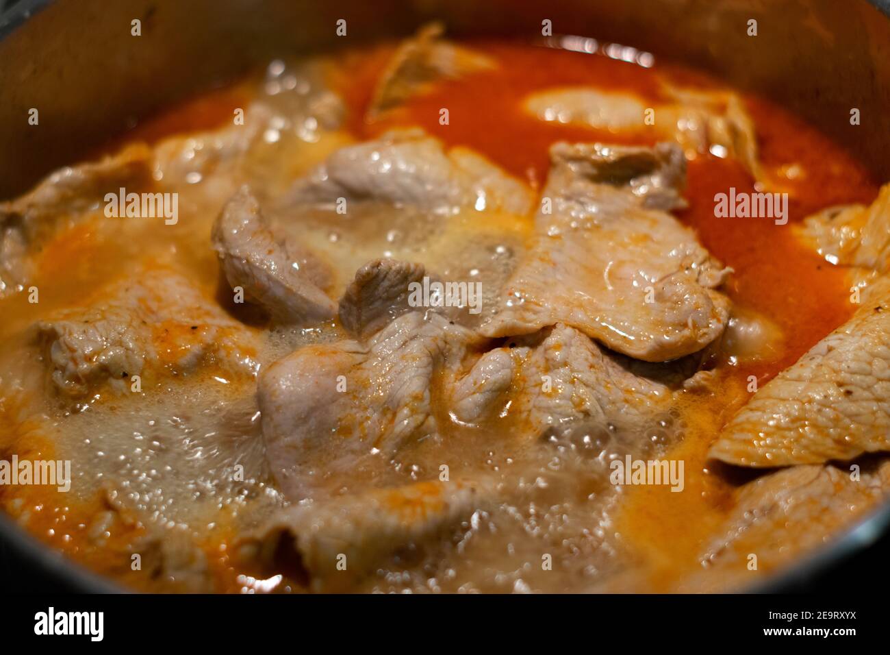 Traditional Portuguese food cooking, porc meat called bifanas or bifana Stock Photo