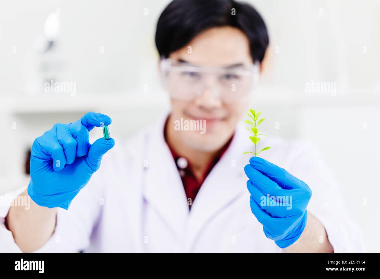 Scientists shown anti-virus medicine pill that successful extracted from natural plants. Stock Photo