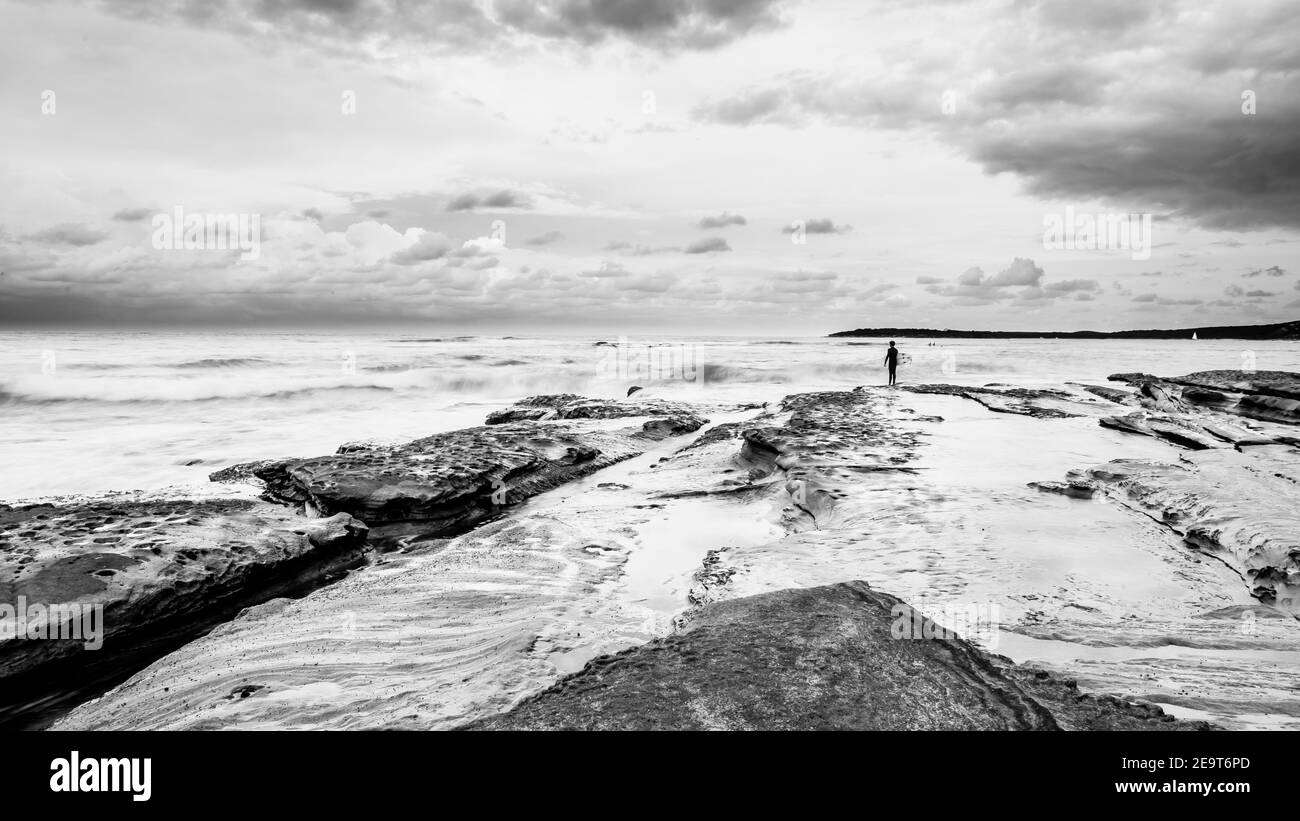 Surfing australia wave beach sunset Black and White Stock Photos ...