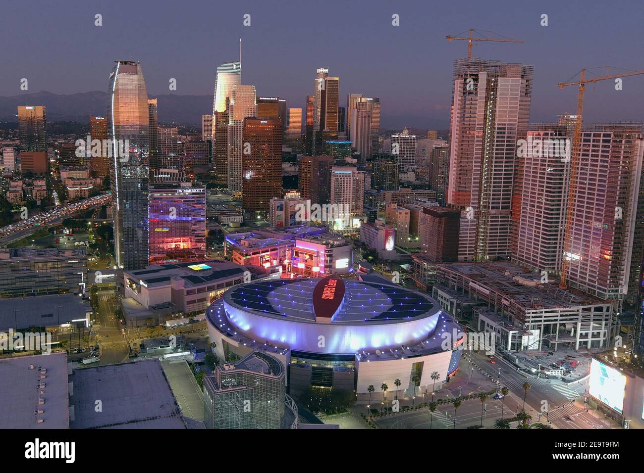 An aerial view of the Staples Center and downtown skyline, Friday, Feb. 5, 2021, in Los Angeles. The arena is the home of the Los Angeles Lakers and L Stock Photo