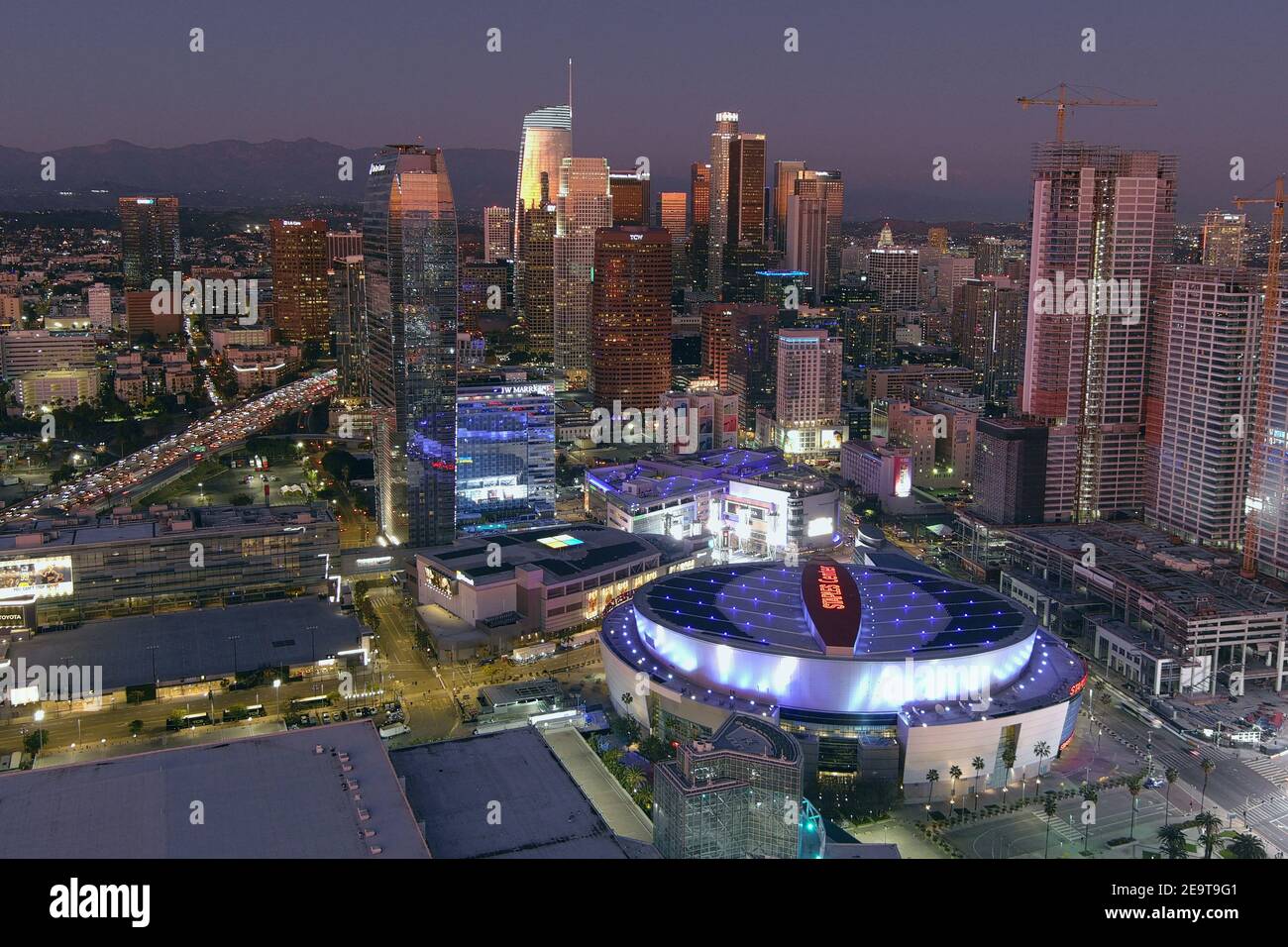An aerial view of the Staples Center and downtown skyline, Friday, Feb. 5, 2021, in Los Angeles. The arena is the home of the Los Angeles Lakers and L Stock Photo