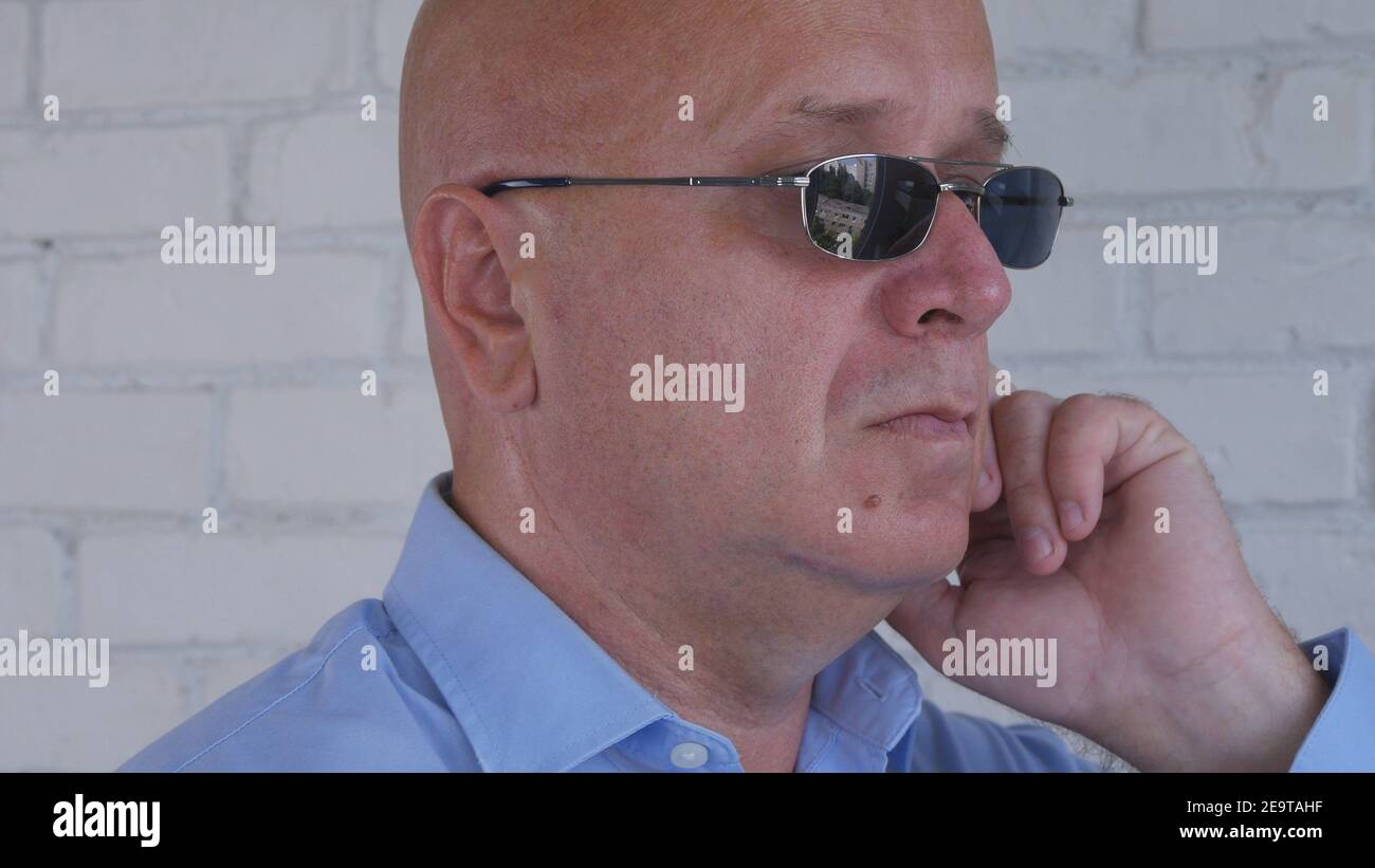 Bodyguard Image Wearing Black Sunglasses Doing a Security Job Stock