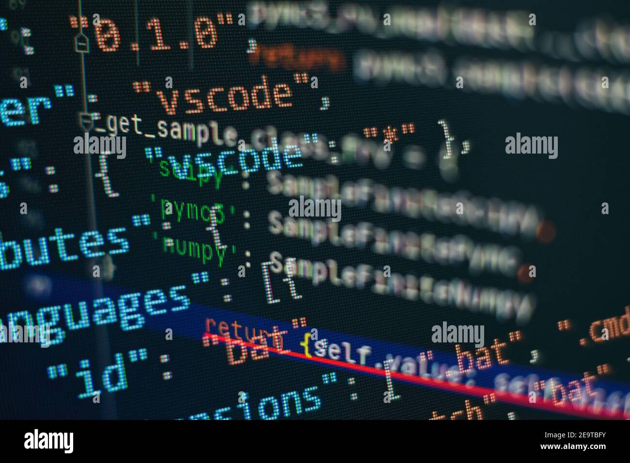 Website HTML Code on the Laptop Display Closeup Photo. Information technology website coding standards for web design Programmer developer screen. Stock Photo