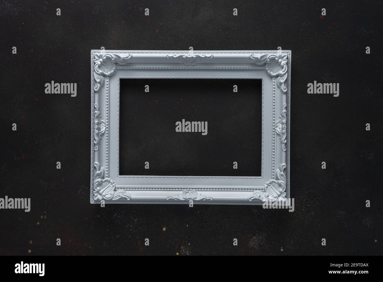 Creative layout with white frame on black background. Minimal abstract pattern. Copy space. Stock Photo