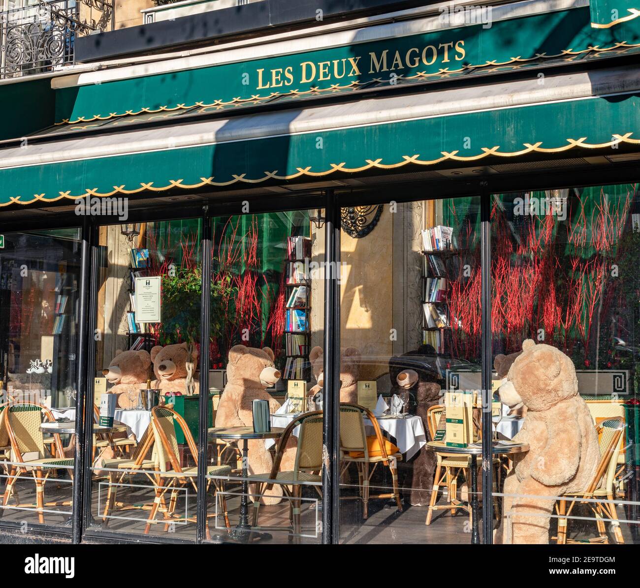 Teddy bears in cafe Les Deux Magots during Covid-19 Lockdown in Paris, France Stock Photo