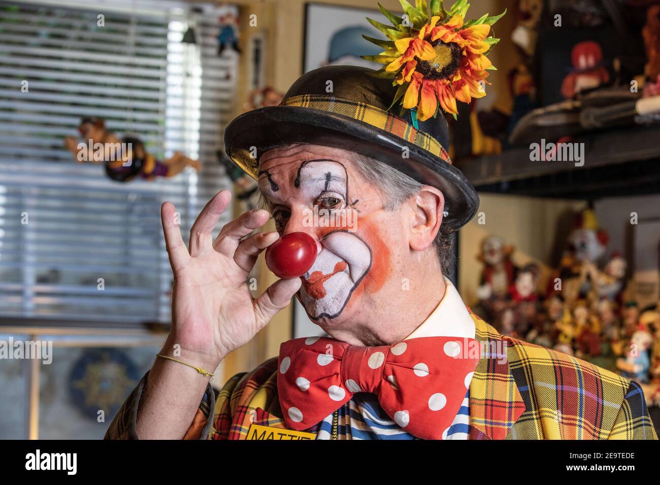 PHOTO:JEFF GILBERT 05th February 2021. Clerkenwell, London, UK Mattie chief clown and organiser of Clowns international preparing to celebrate the 75th anniversary of Grimaldi Clown service on Sunday 7th February 2021, at his home in Clerkenwell in the area where Joseph Grimaldi also lived from 1818 to 1829. The annual church service cannot take place this year due to COVID restrictions . But Mattie will has prepared a virtual church service showing historical clips to celebrate the occasion. Credit: Jeff Gilbert/Alamy Live News Stock Photo