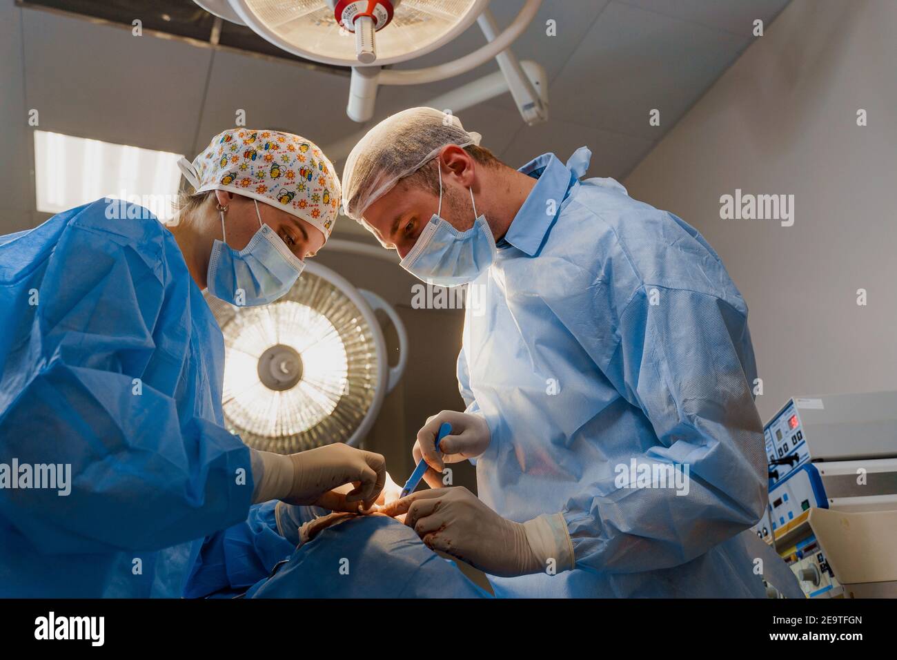 Lipofilling surgery operation. 2 surgeon do plastic surgery named