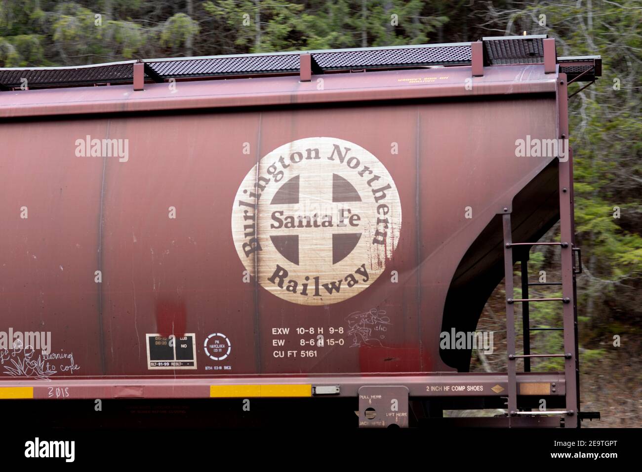 The Burlington Northern and Santa Fe Railway (BNSF) logo on railroad covered hopper car, Troy, Montana  Burlington Northern and Santa Fe Railway was f Stock Photo