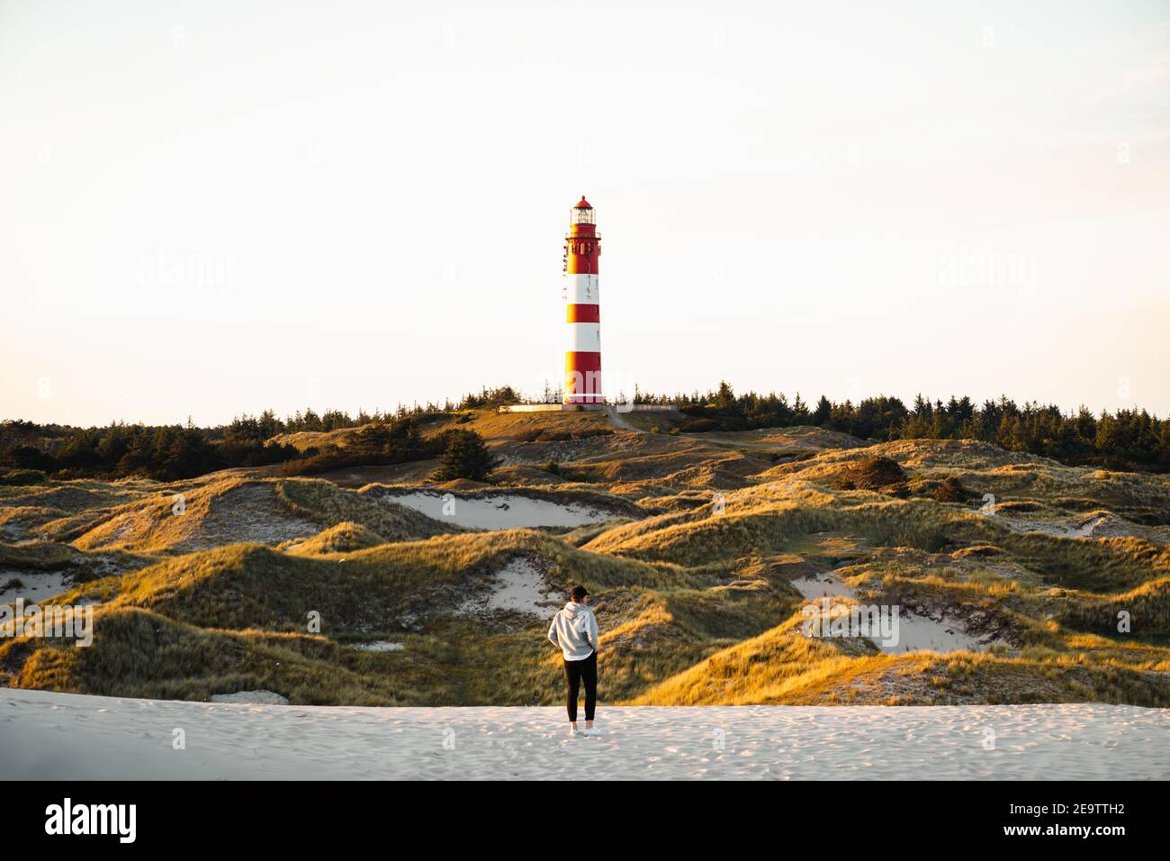 Lonely lighthouse on pier hi-res stock photography and images - Alamy