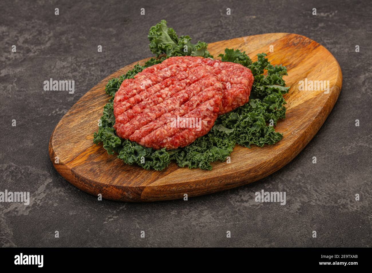 Raw beef burger cutlet for grill Stock Photo Alamy