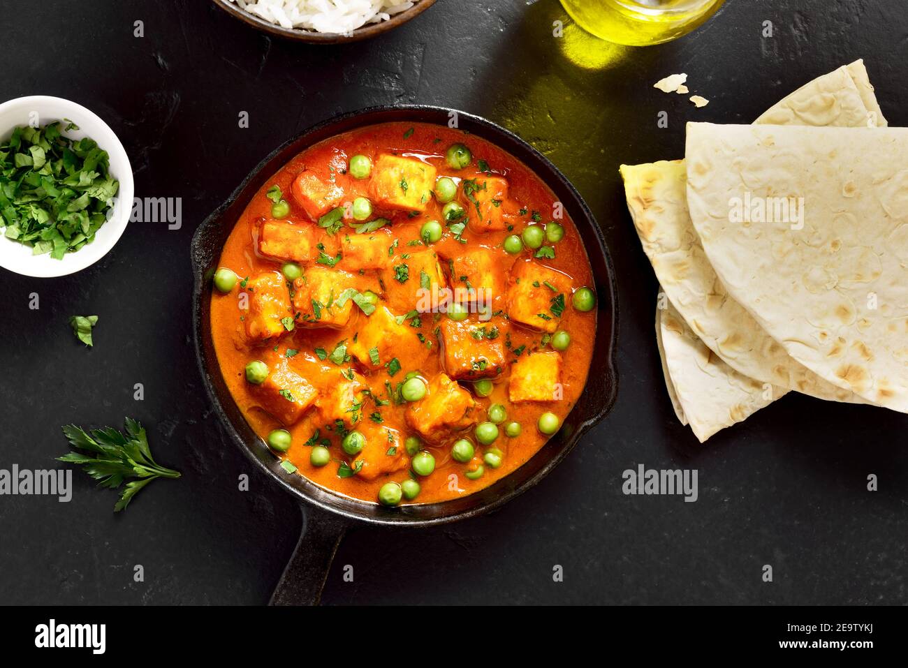 Paneer butter masala. Indian style cottage cheese curry in frying pan