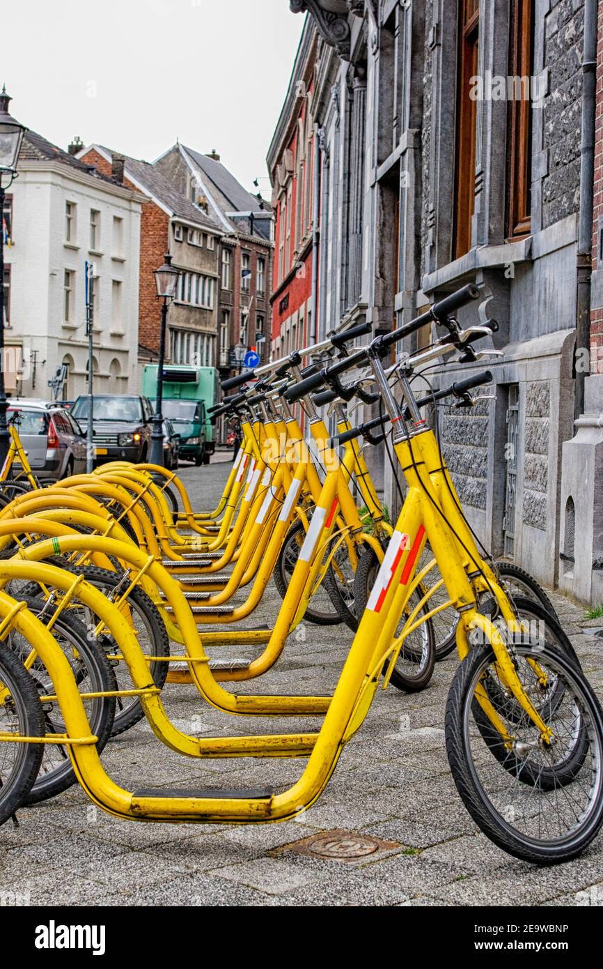 Yellow autopeds for tourists on the street in the Netherlands Stock Photo