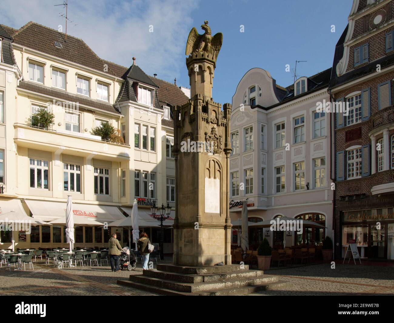 Column wih eagle on top on Altmarkt in Moers, Nordrhein-Westfalen, Germany. Stock Photo