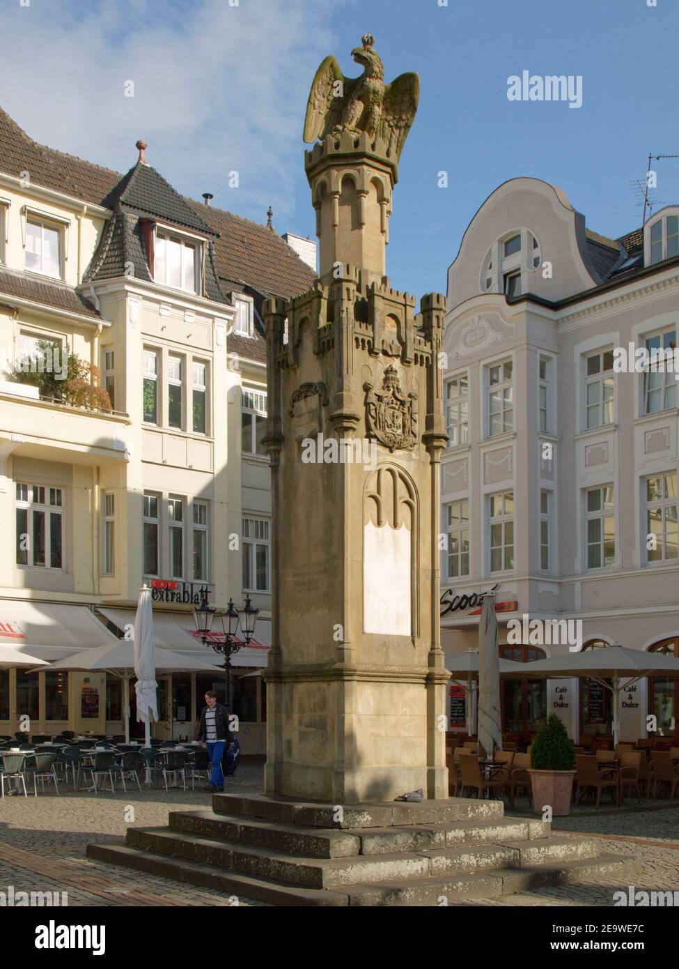 Column wih eagle on top on Altmarkt in Moers, Nordrhein-Westfalen, Germany. Stock Photo