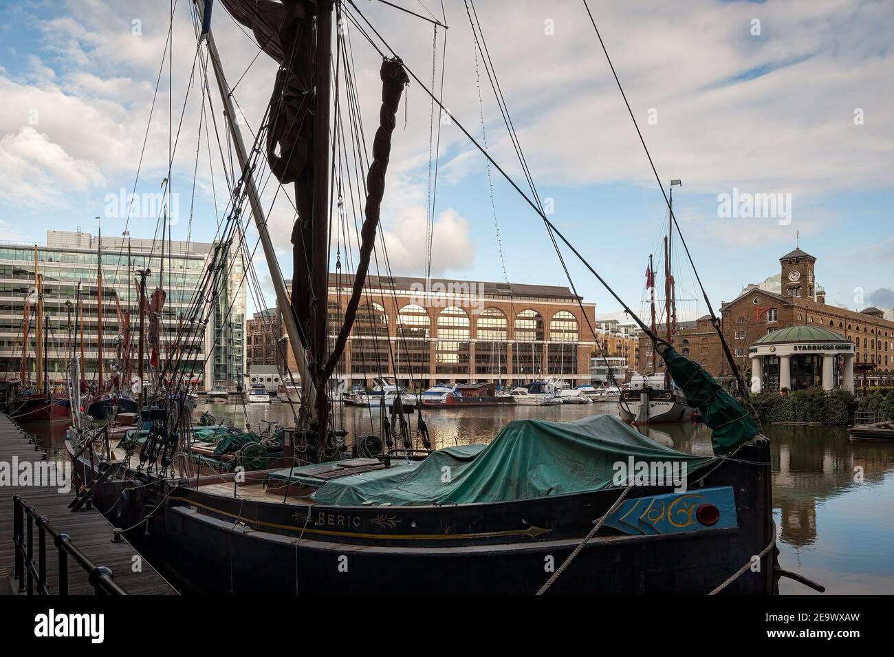 LONDON, UK - JANUARY 03, 2010: Old sailing barge moored in St Katharine Dock, City of London Stock Photo