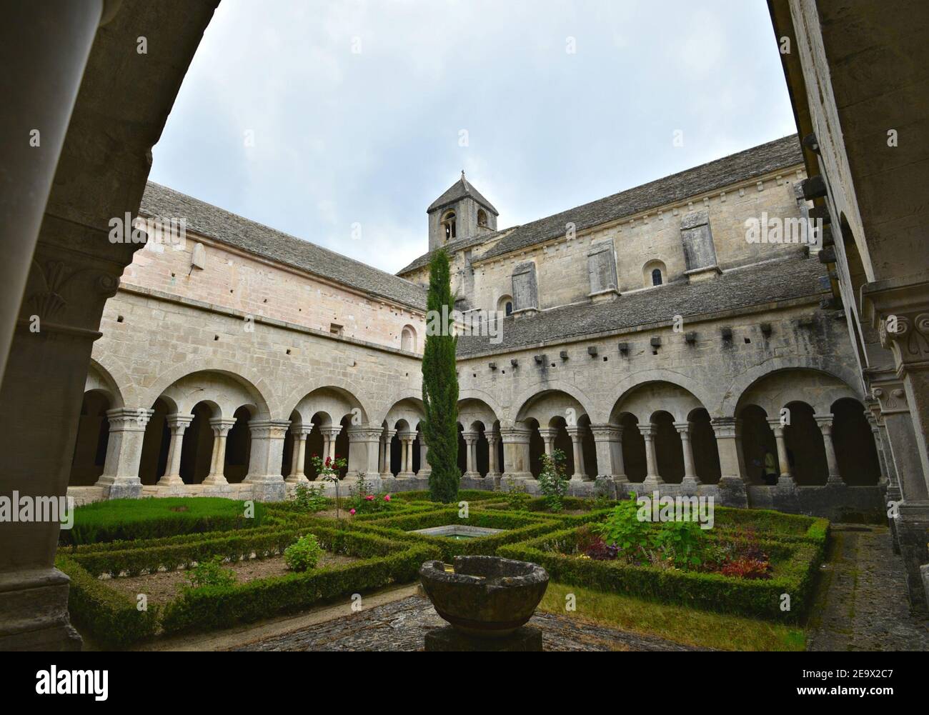 Inner courtyard view of the Sénanque Abbey a Cistercian community near the historic village of Gordes in Vaucluse Provence France. Stock Photo