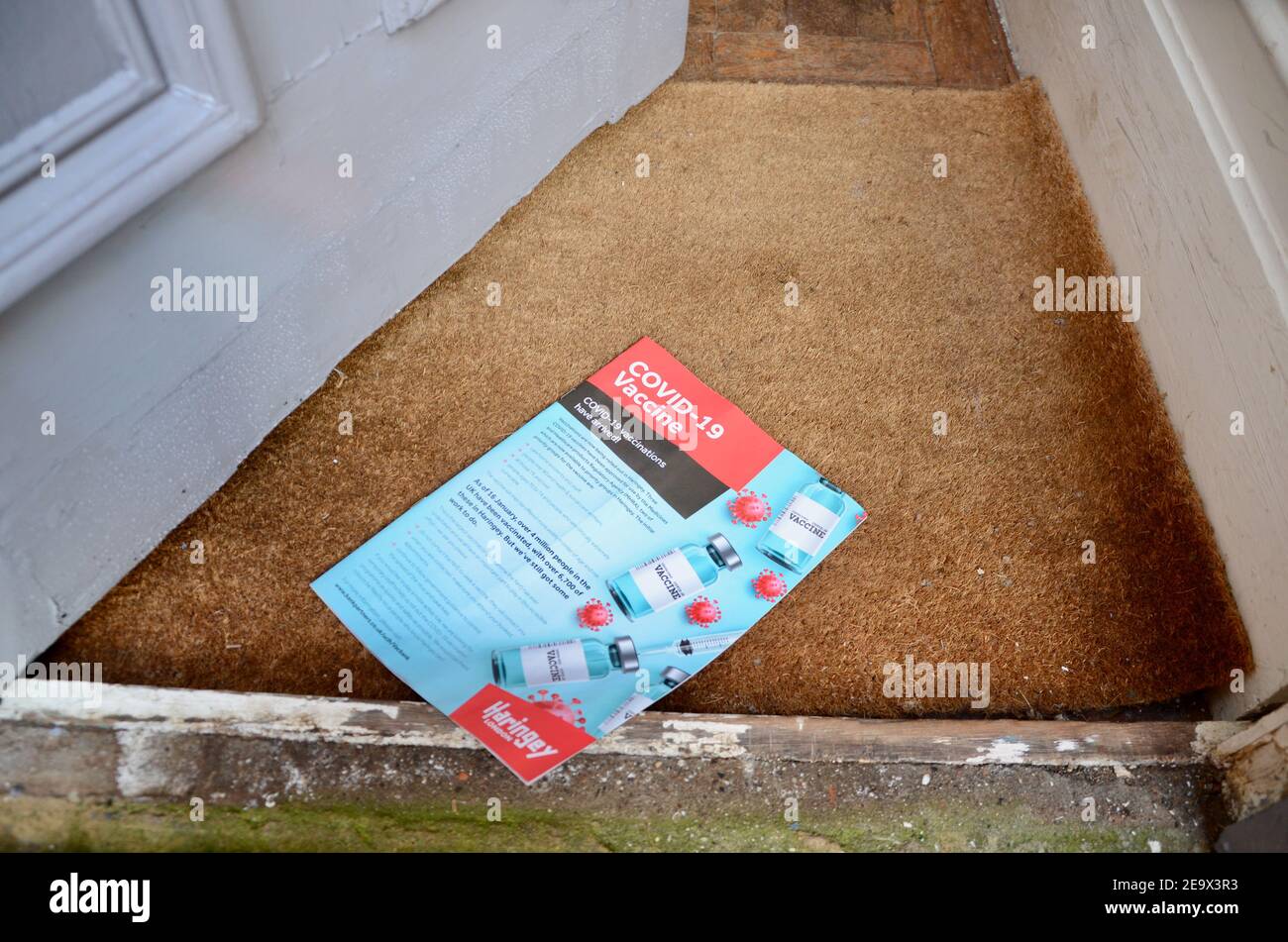haringey people free magazine with covid 19 vaccine announcement cover on doormat london england Stock Photo
