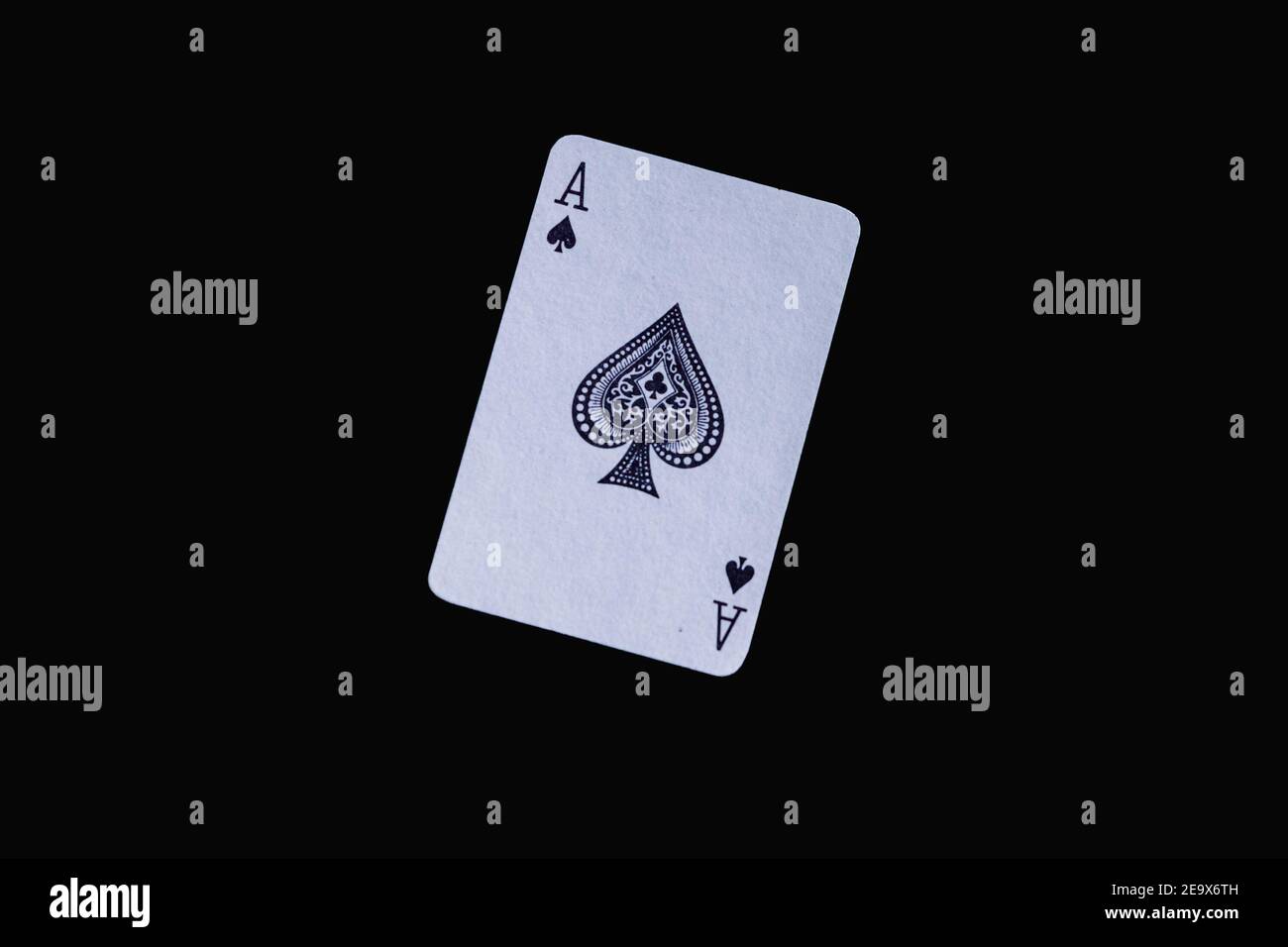 Ace card isolated on a black background Stock Photo - Alamy