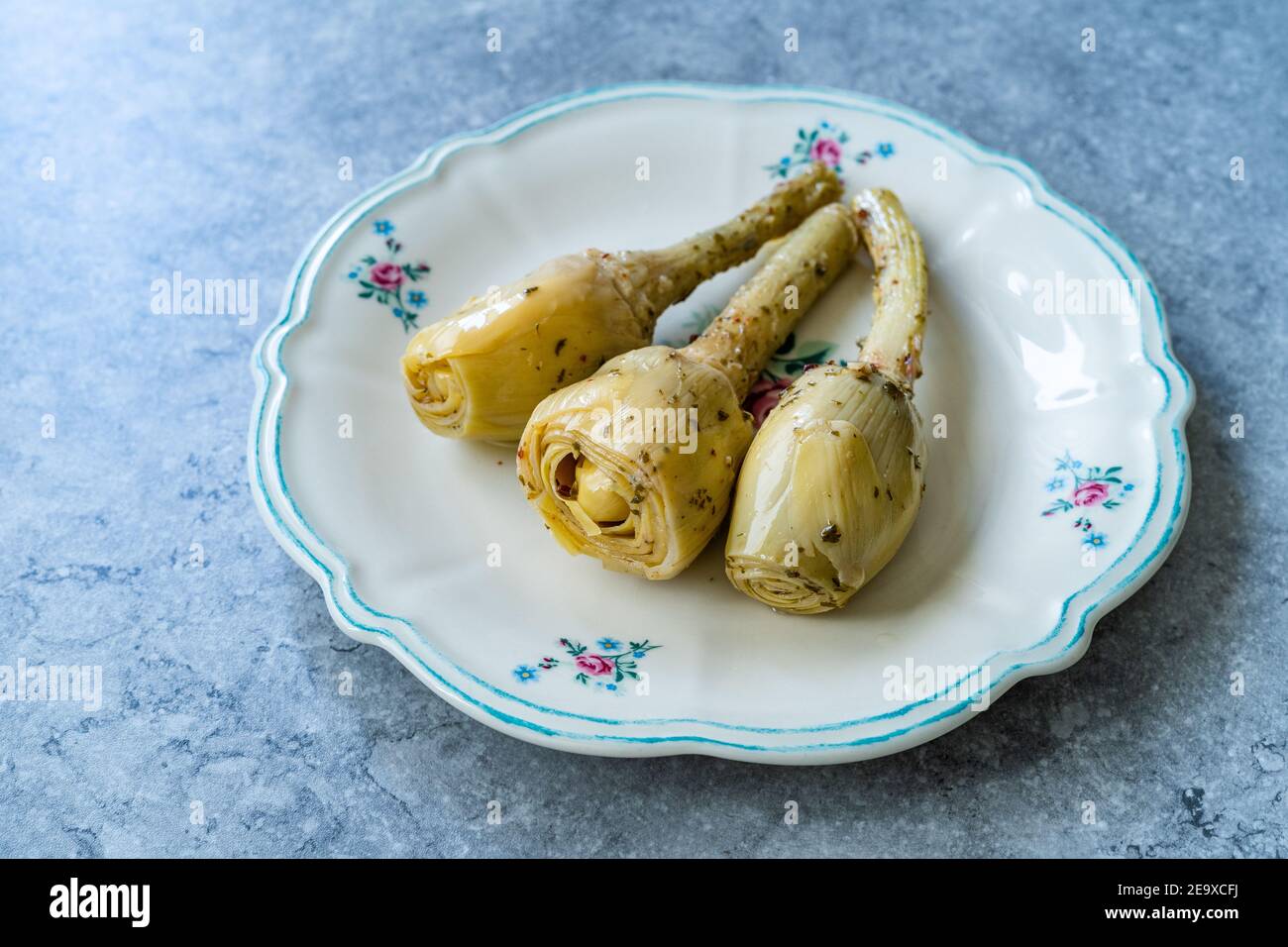 Marinated Spicy Artichoke Hearts in Olive Oil served with Root. Ready