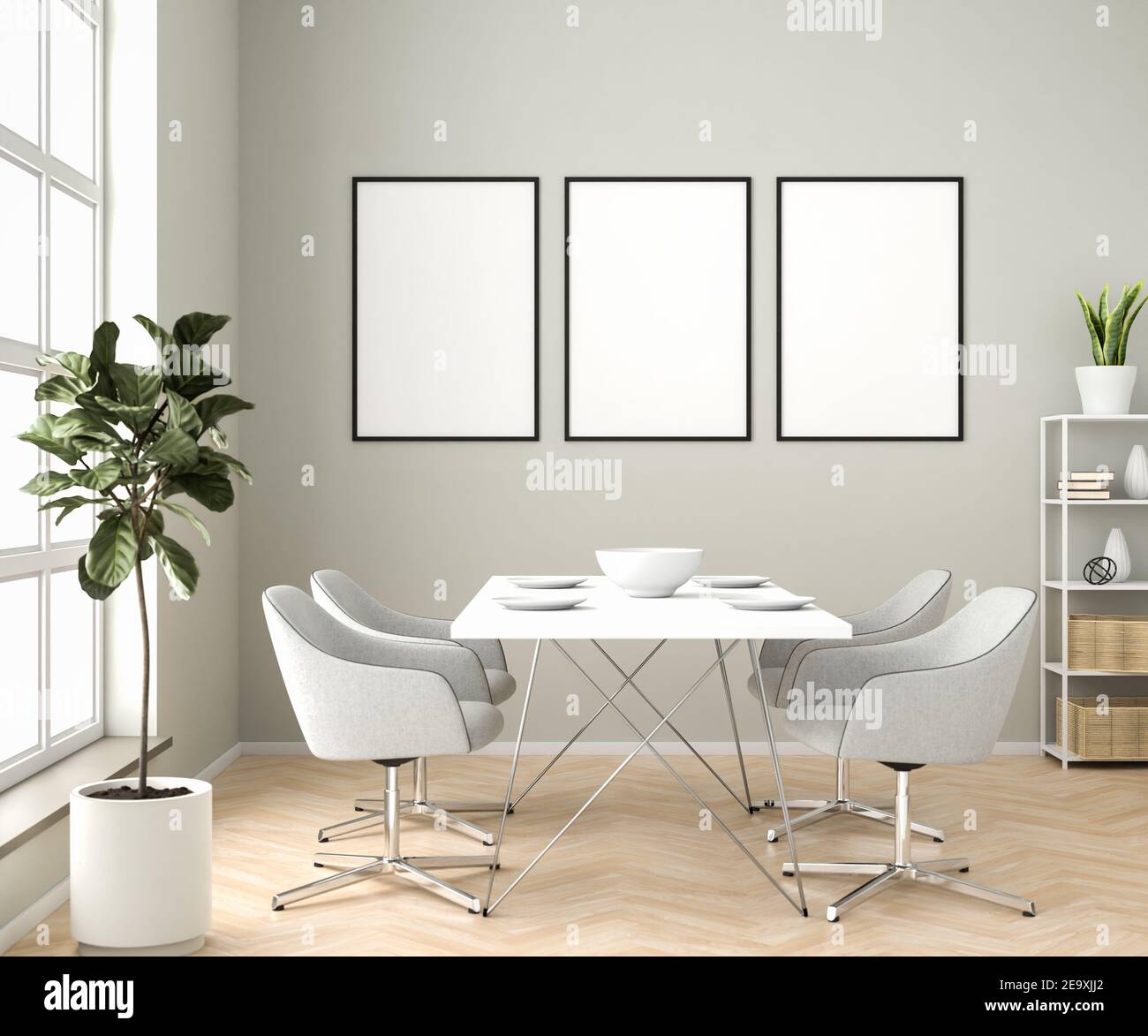 Interior setting with dining area and three blank picture frame mockups. Stock Photo