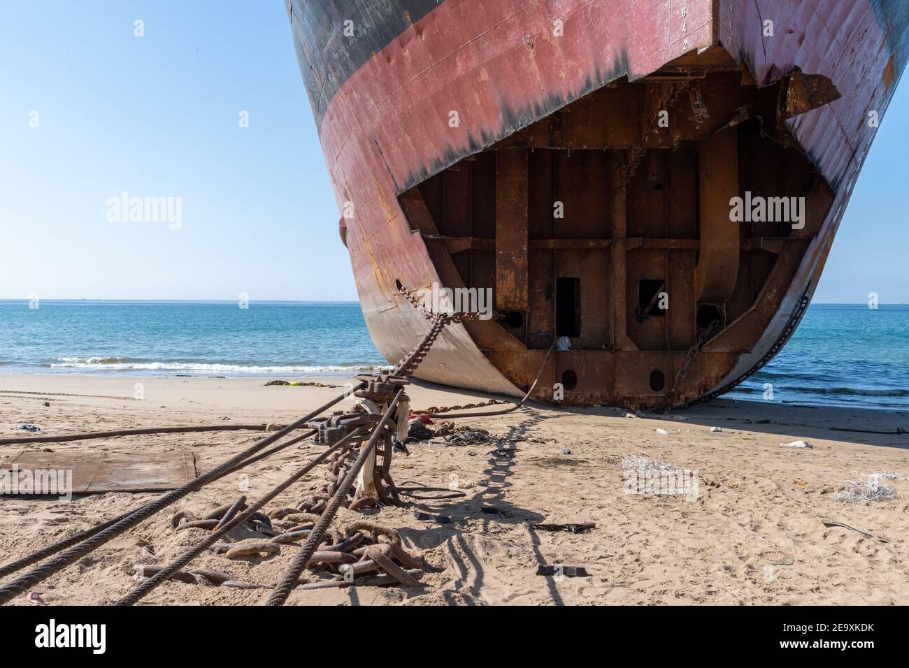 Ship being broken up at Gadani ship-breaking yard, located across a 10 km long beachfront, Balochistan, Pakistan. Stock Photo