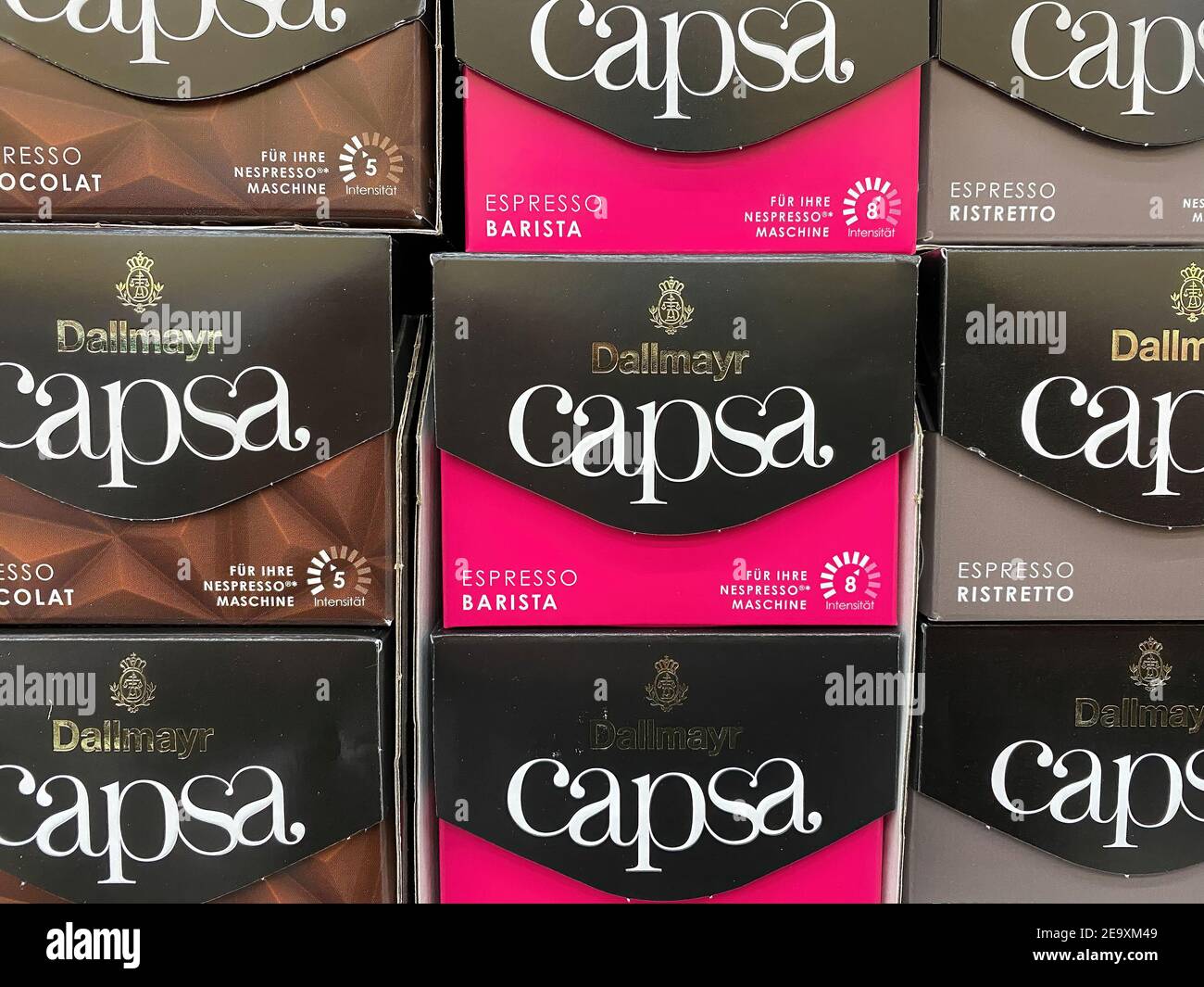 Viersen, Germany - February 3. 2021: View on carton boxes Dallmayr capsa coffee capsules  in shelf of german supermarket Stock Photo