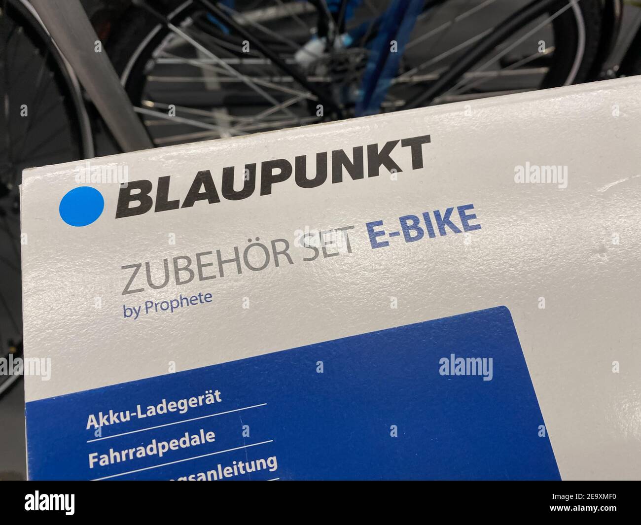 Viersen, Germany - February 3. 2021: View on carton box with Blaupunkt e-bike accessories in german supermarket Stock Photo
