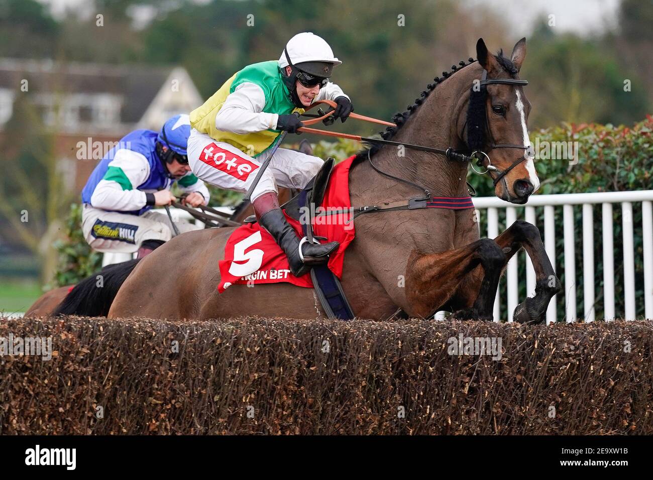 Deise Aba ridden by Richard Johnson clear the last to win The Virgin Bet Masters Handicap Chase at Sandown Park Racecourse, Esher. Picture date: Saturday February 6, 2021. Stock Photo