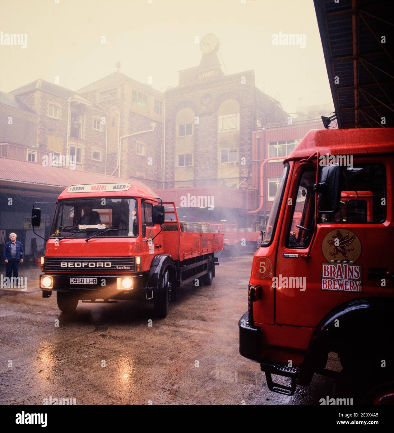 Delivery Lorries (Drays) in a foggy yard at Brains Brewery, Cardiff Stock Photo