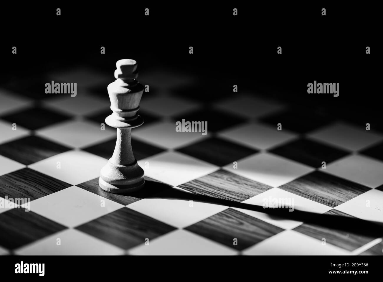 Download Black and White Chess Battle on the Board Wallpaper